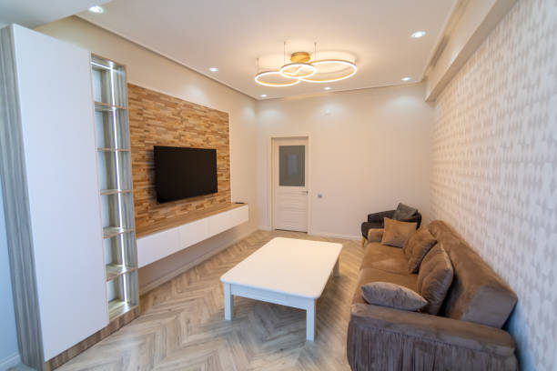 Modern accent lighting illuminating living room with sleek design features